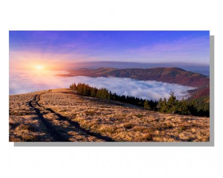 Obrazy na plátne Dimex - Východ slnka v horách 90 x 50 cm